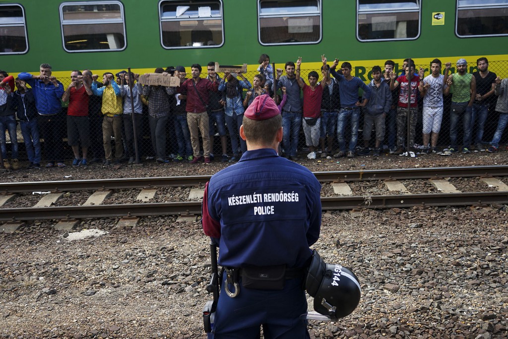 RS19068_Syrian_refugees_strike_at_the_platform_of_Budapest_Keleti_railway_station._Refugee_crisis._Budapest,_Hungary,_Central_Europe,_4_September_2015._(3)